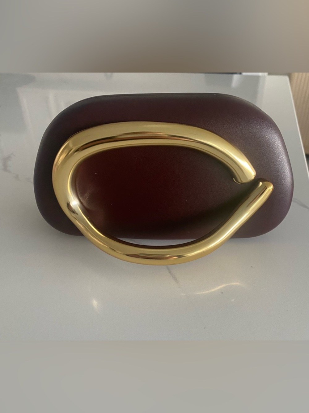 Women's Burgundy/Brown Leather Clutch with Gold Sculptural Handle. BRAND NEW.